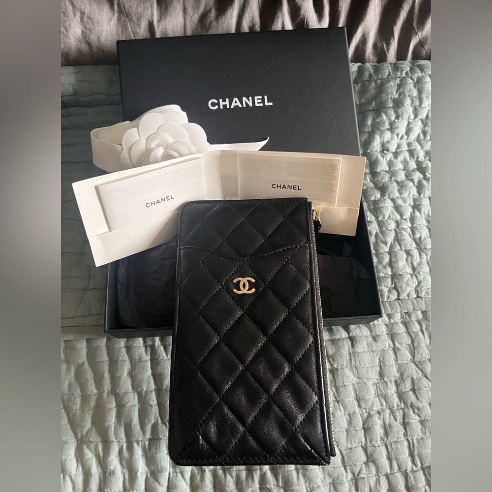 Chanel lambskin quilted phone case wallet